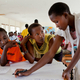 Young Masai girls participate in a group exercise at a 2013 alternative rites of passage workshop. (Anja Legtenberg)